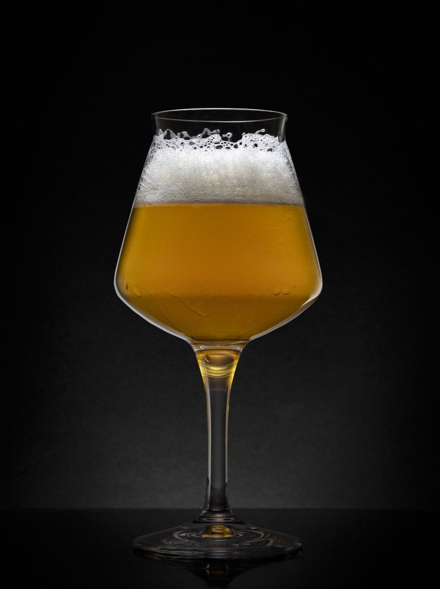 A freshly poured hazy IPA in a tulip glass